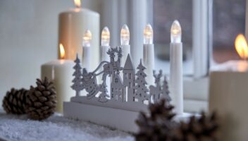 Christmas candles on windowsill