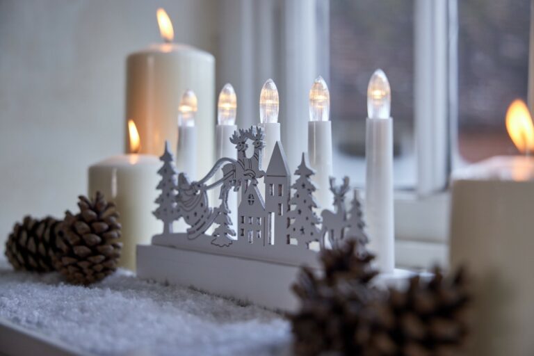 Christmas candles on windowsill